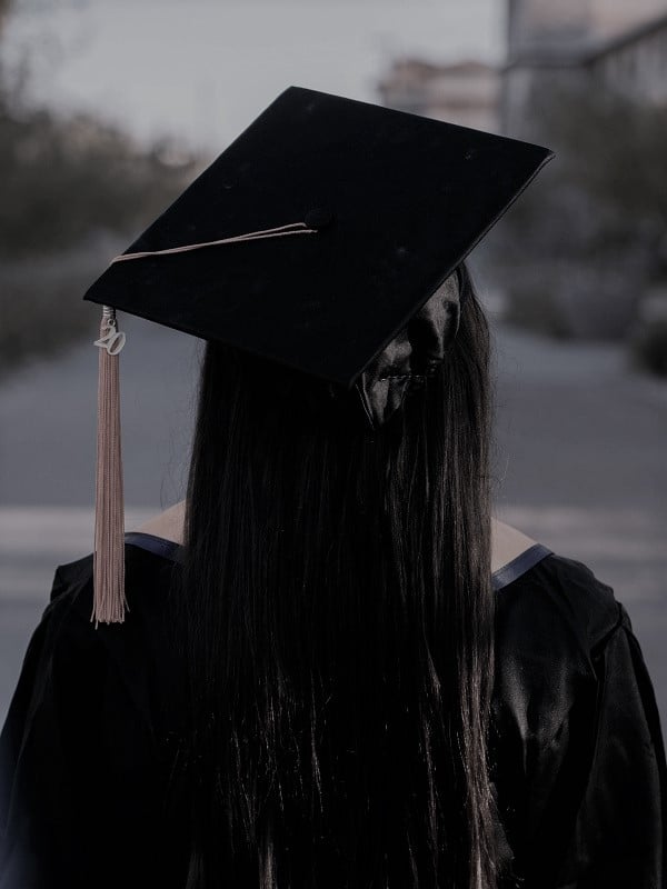 Female graduate in cap and gown